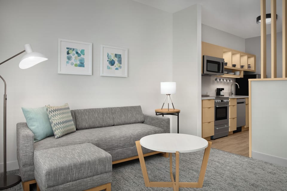 Suite, 1 Bedroom | Living room | 55-inch Smart TV with satellite channels, Netflix, Hulu