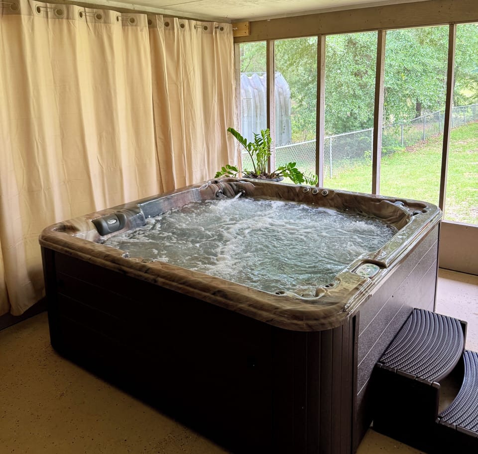 6 person hot tub with lounger