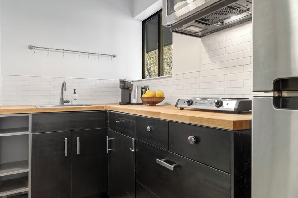 Spacious Galley Kitchen with all your basic cooking needs.