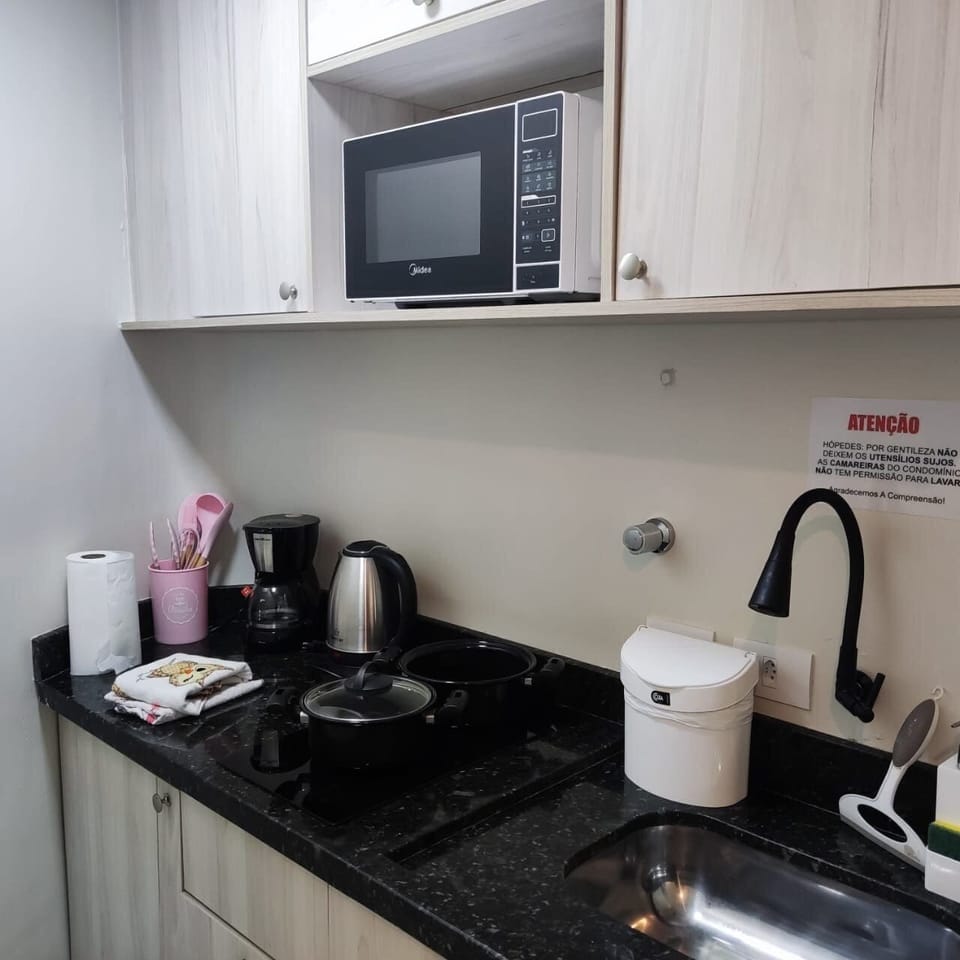 Apartment | Private kitchen | Mini-fridge, microwave, stovetop, cookware/dishes/utensils