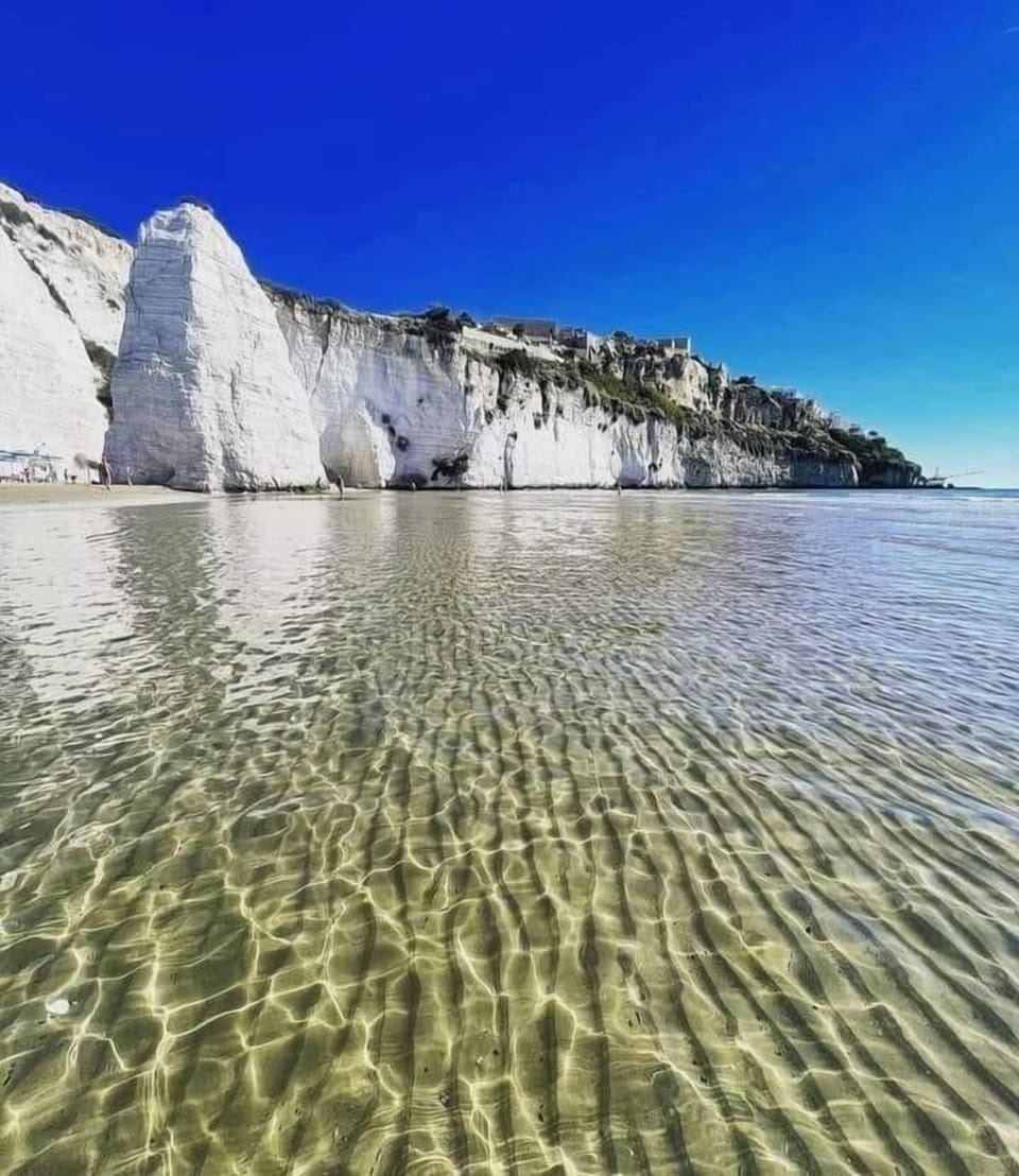 Beach nearby, white sand, sun loungers, beach umbrellas