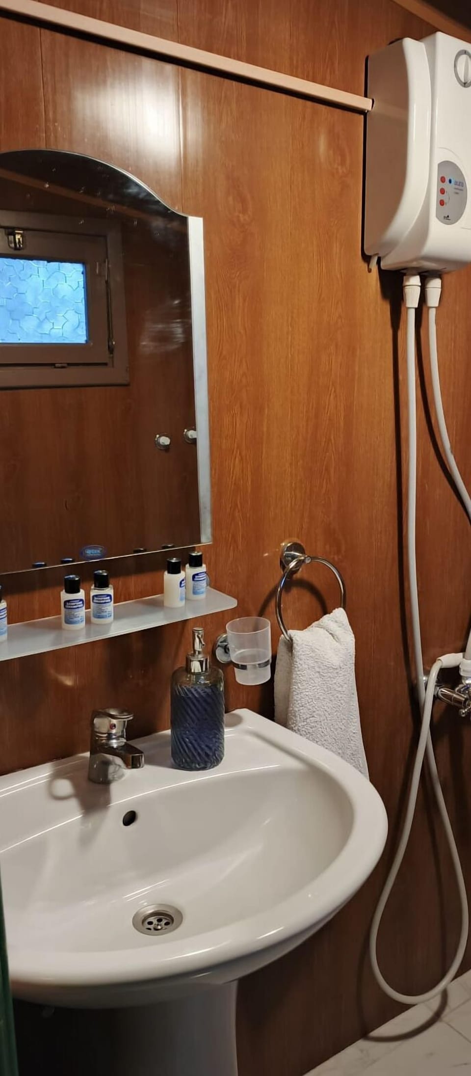 Hair dryer, slippers, towels, soap