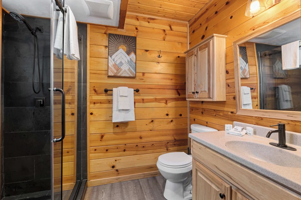 Master bath with heated floors. We take cleanliness seriously - the house is professionally deep cleaned after every stay and always inspected.