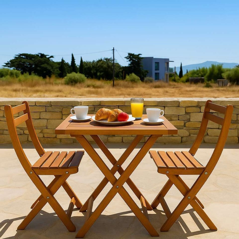 View from the Private Patio – Relaxing Outdoor Setup
Enjoy breakfast or sunset drinks with peaceful garden surroundings.
