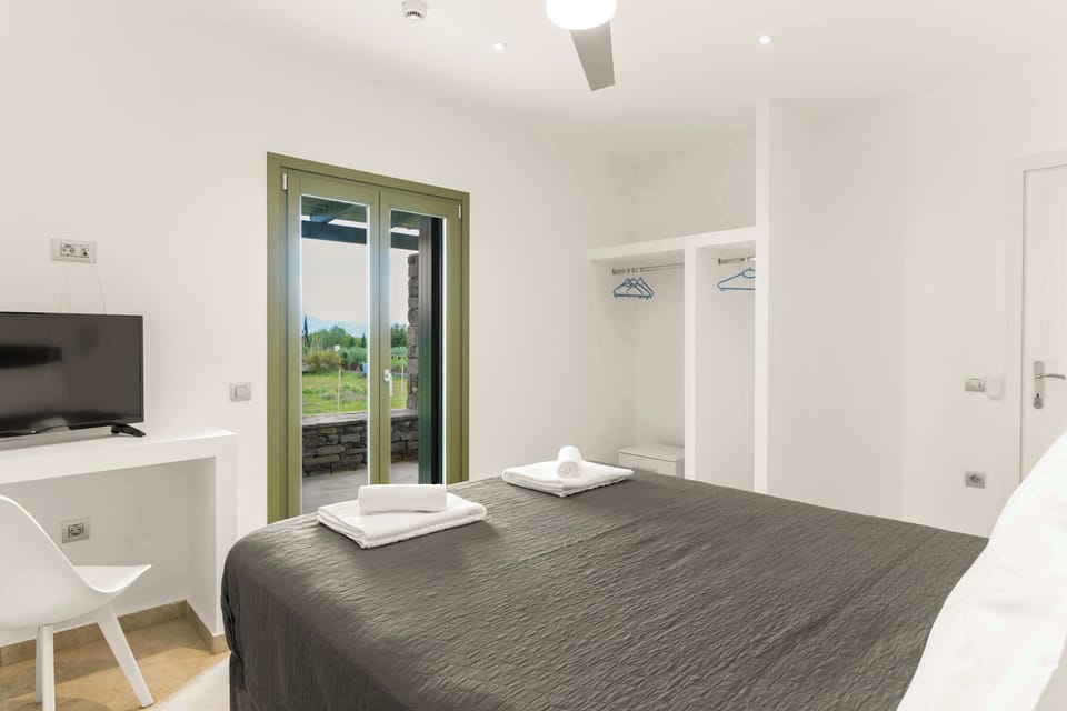Double Bedroom – Window Shutters and Garden View
A welcoming and tranquil sleeping space.