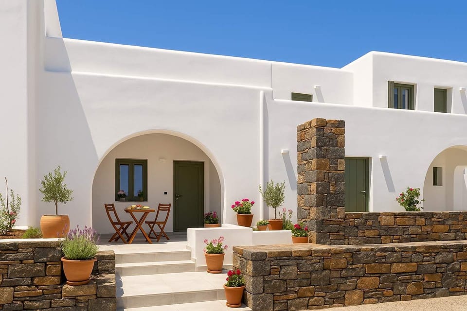 Entrance to the Premises – Cycladic Charm
A welcoming front view with traditional stone accents and whitewashed walls.
