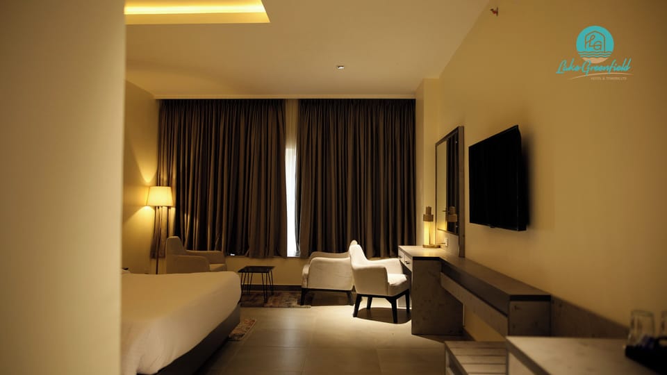 Egyptian cotton sheets, premium bedding, minibar, in-room safe