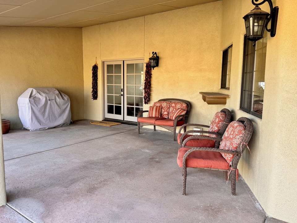 Covered porch with grill facing the Mingus Mountains