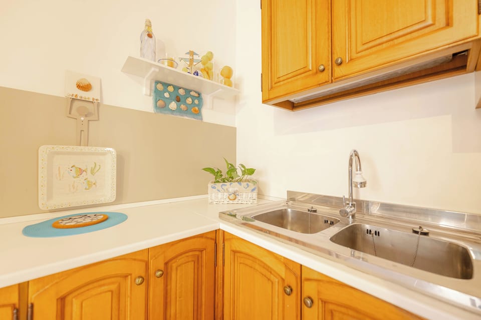 Basic Condo | Private kitchen | Full-size fridge, microwave, espresso maker, electric kettle