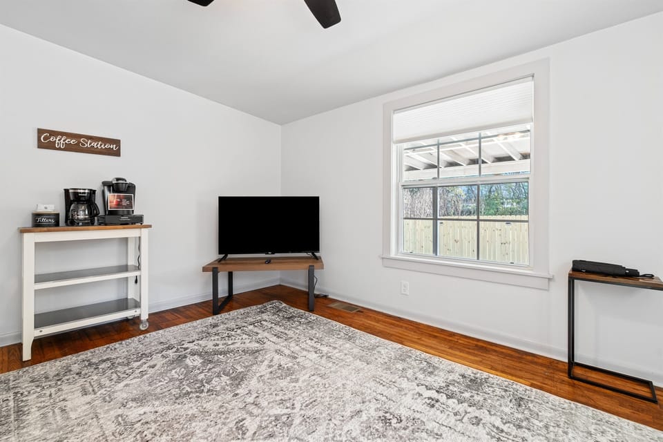 Cozy Living Room with Scenic Window Views | Front Home