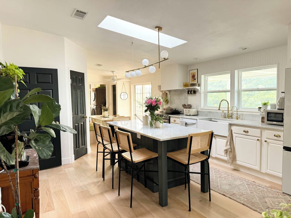 Open plan kitchen with large island that seats 5