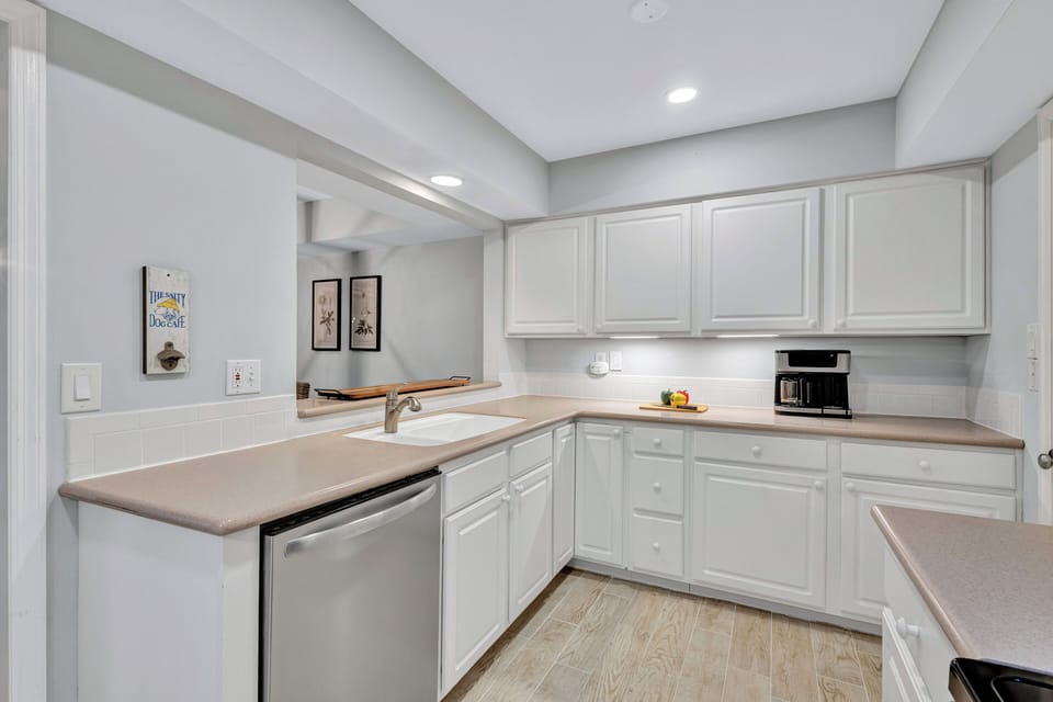 The villa is equipped with a fully stocked kitchen, washer, and dryer, ensuring a hassle-free stay.