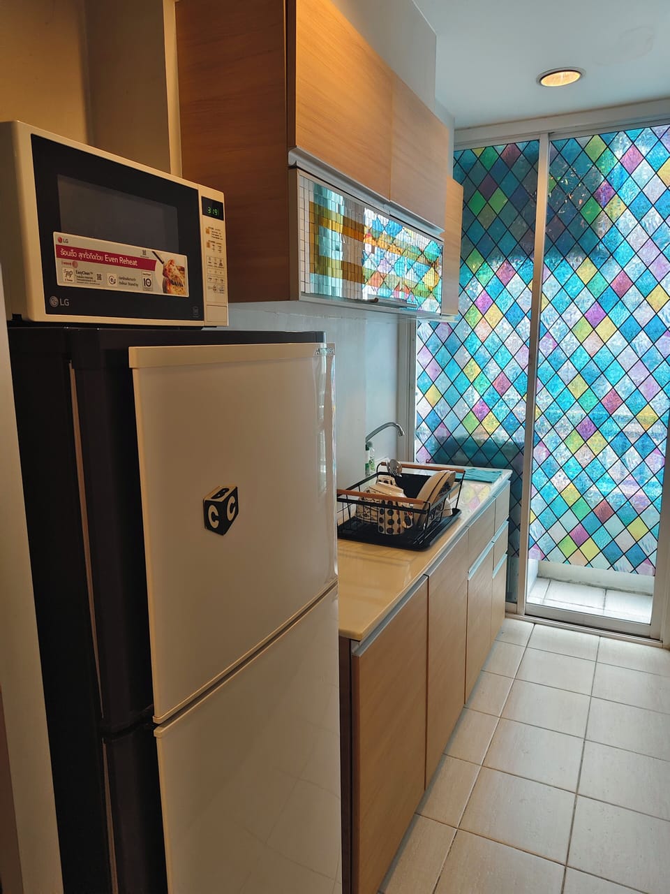 Condo, 1 Double Bed with Sofa bed, Smoking, Balcony | Private kitchen | Electric kettle