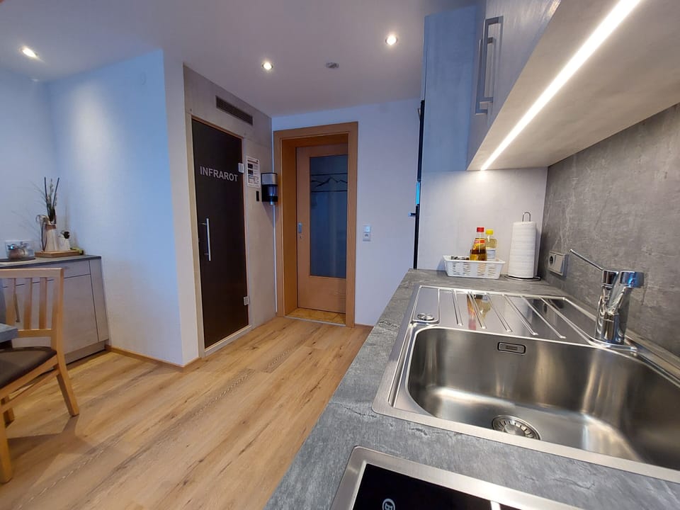 Deluxe Condo, 3 Bedrooms, Balcony, River View | Private kitchen | Highchair