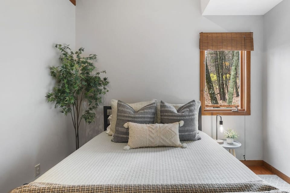 One Queen size bed in bedroom #3 with a closet, full length mirror and room-darkening shades.