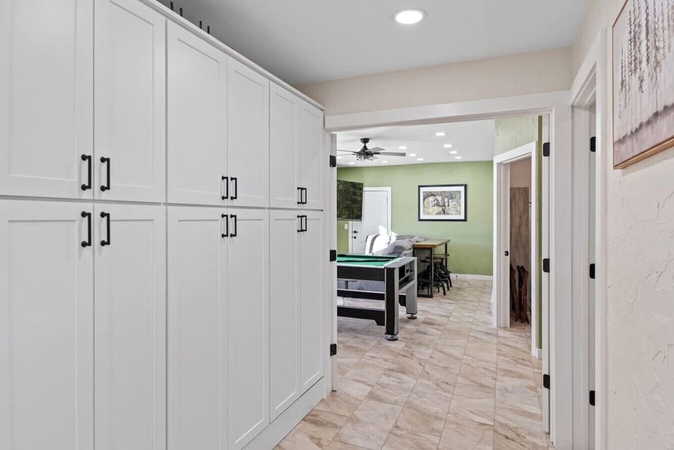 Spacious closet and a convenient path leading to the exciting game room.