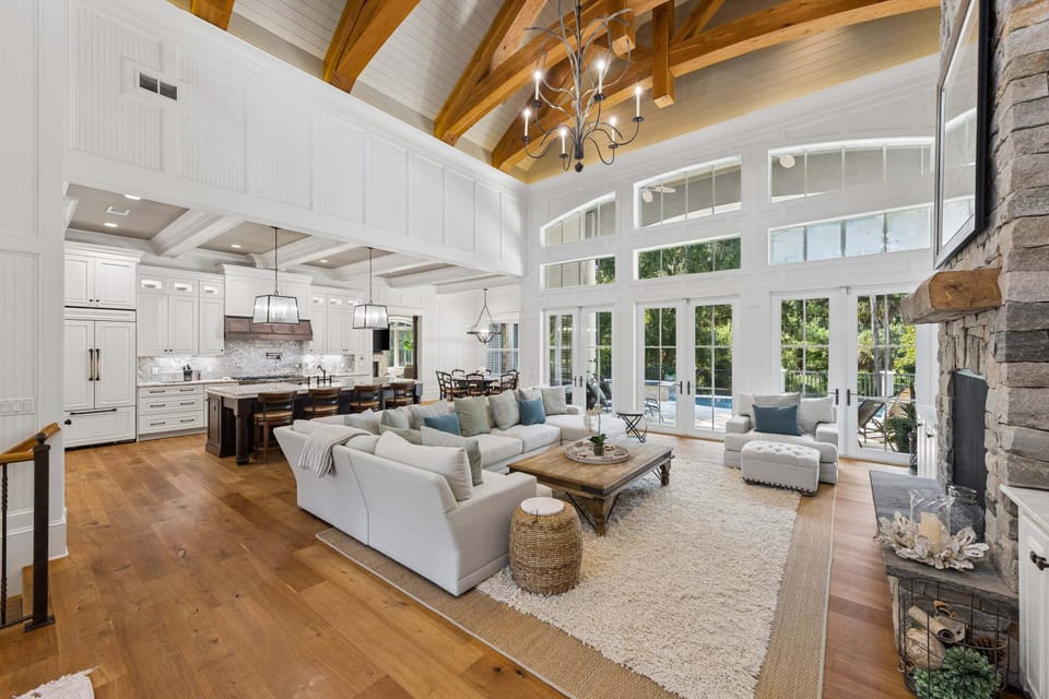 Multiple family rooms, including a large living room and cozy family room, ideal for gathering.