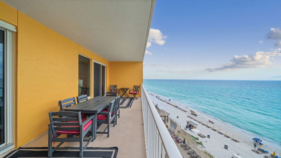 Gulf-front balcony with panoramic ocean views – perfect for sunr
