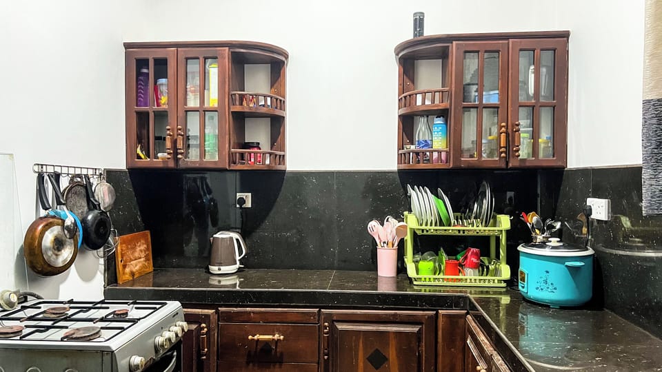 Family Apartment, Multiple Beds, Ground Floor | Private kitchen | Shared fridge