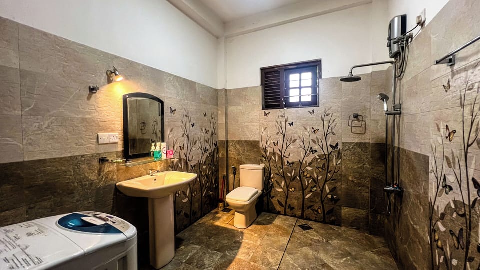 Family Apartment, Multiple Beds, Ground Floor | Bathroom | Shower, free toiletries, hair dryer, towels