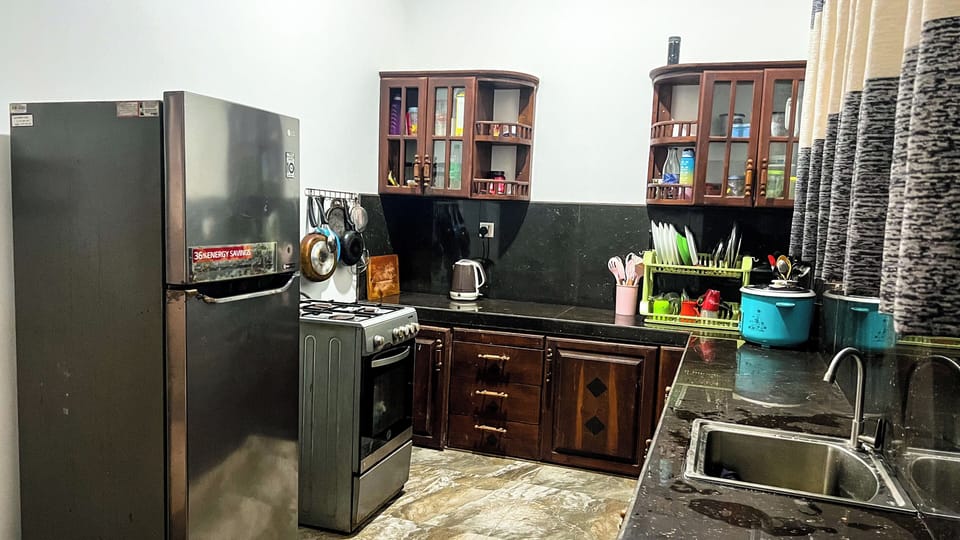 Family Apartment, Multiple Beds, Ground Floor | Private kitchen | Shared fridge