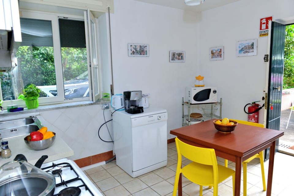 Comfort Apartment, Patio, Garden View | Private kitchen | Fridge, microwave, stovetop, espresso maker