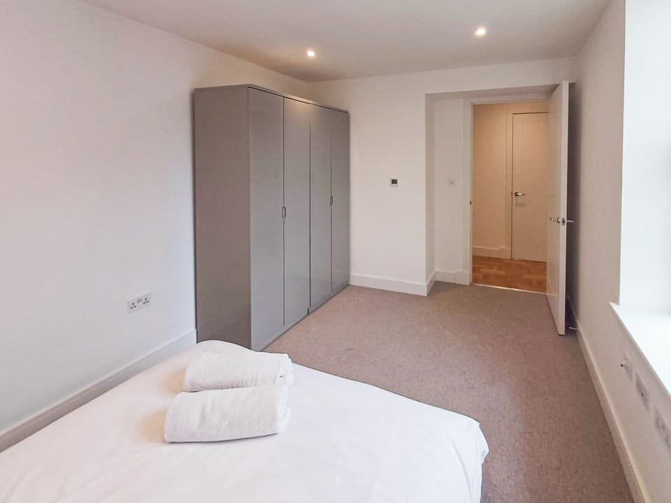 Deluxe Apartment, 2 Bedrooms, Kitchen | 2 bedrooms, desk, laptop workspace, iron/ironing board