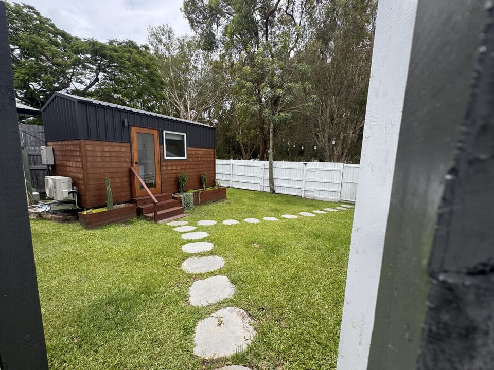 Your back yard and tiny home privacy with surrounding fence.