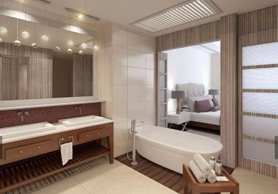 Luxury Triple Room, Multiple Beds, Kitchen, Ocean View | Bathroom | Separate tub and shower, hair dryer, towels, soap