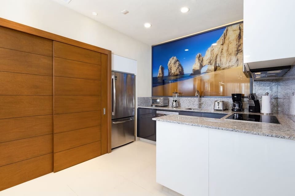 Luxury Suite, 2 Bedrooms, Oceanfront w/Deep Soaking Tub | Private kitchen | Mini-fridge, microwave, coffee/tea maker, cleaning supplies