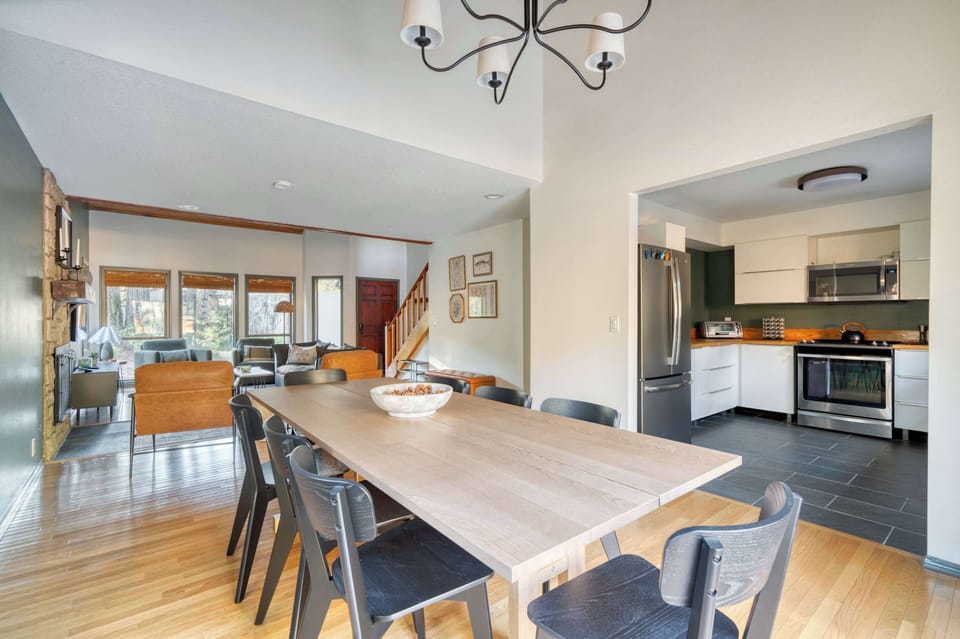 Dining table beside the kitchen and living room.
