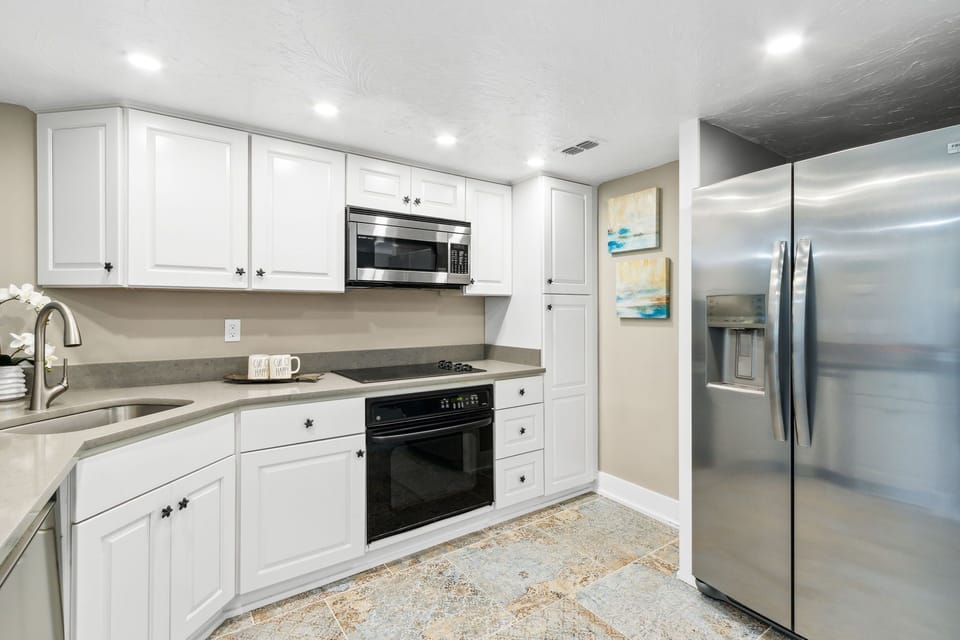 Fully Equipped Kitchen with Stainless Steel Appliancese