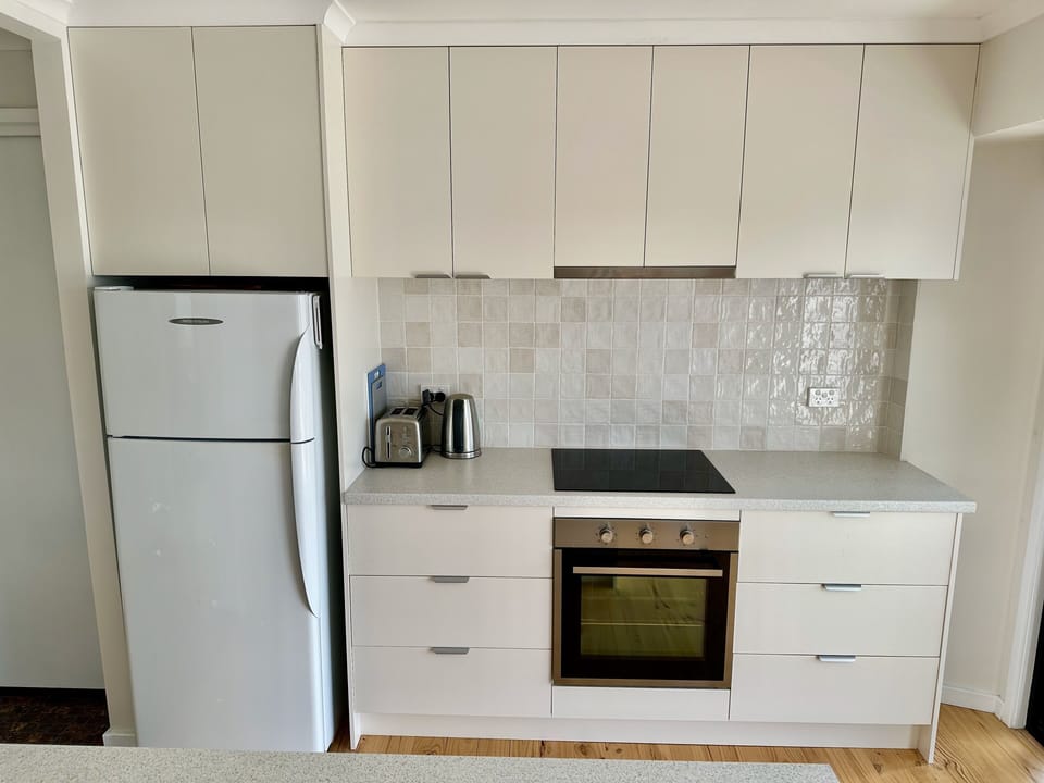Full kitchen facilities including pots & pans. New induction cooktop & oven.