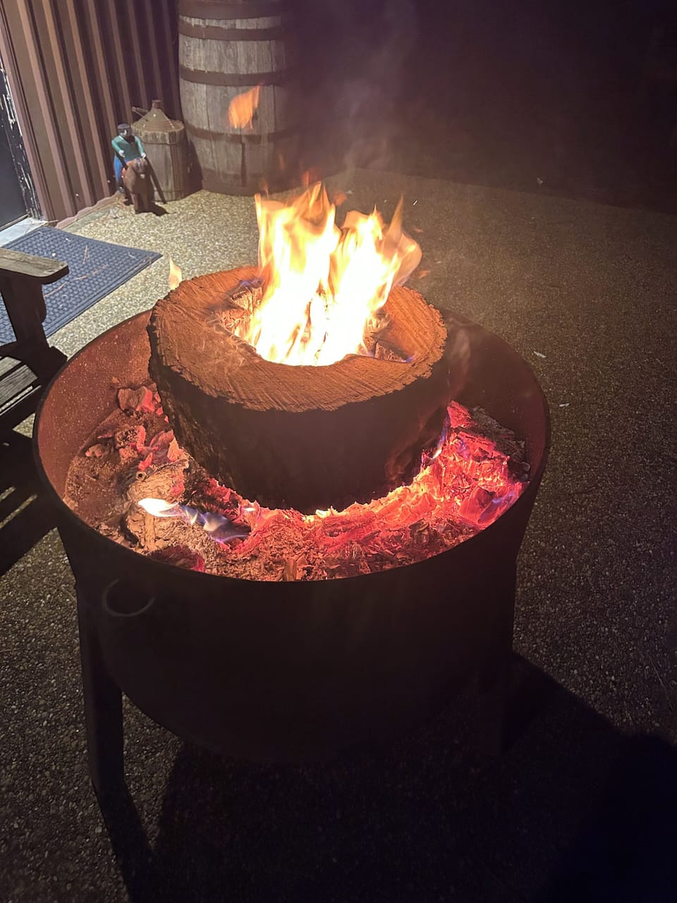 Fire pit with adjustable grill
