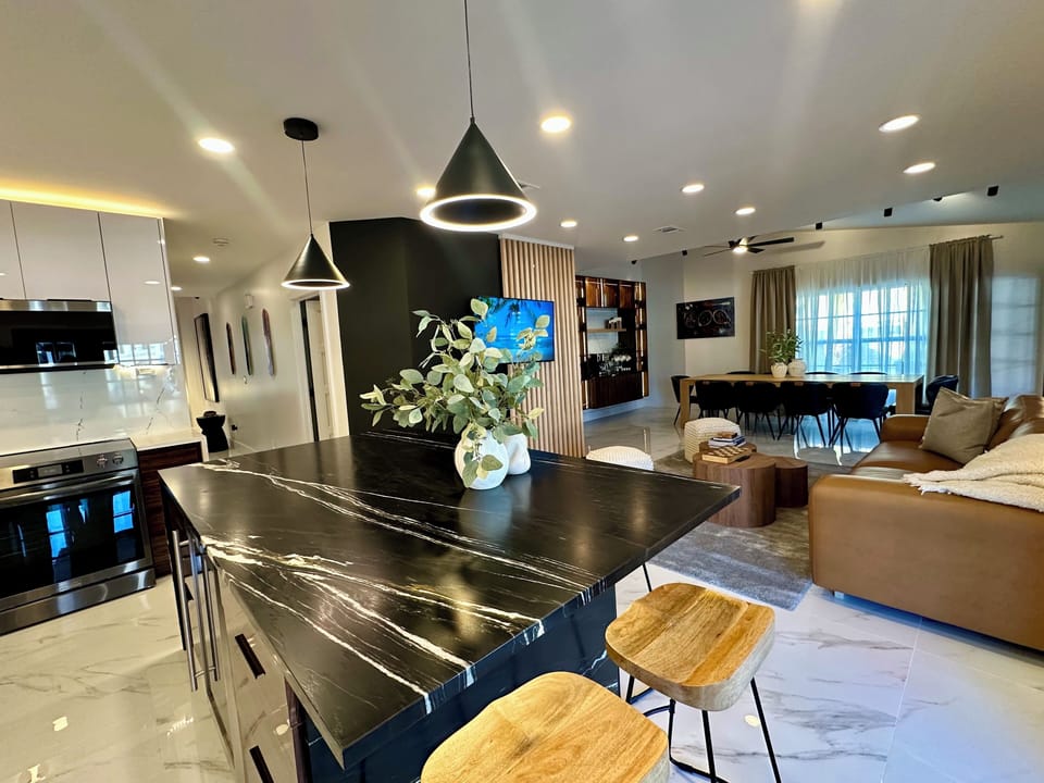 Large Kitchen with the center-located Island & wine cooler.