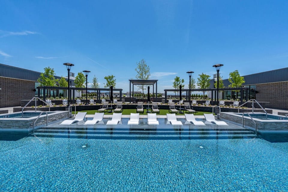 Rooftop pool with jumbotron, amazing views, and two hot tubs- open year round!