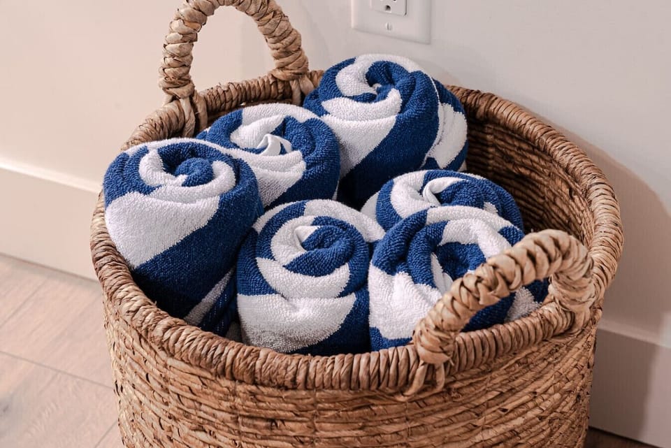 Freshly rolled beach towels, ready for your stay.