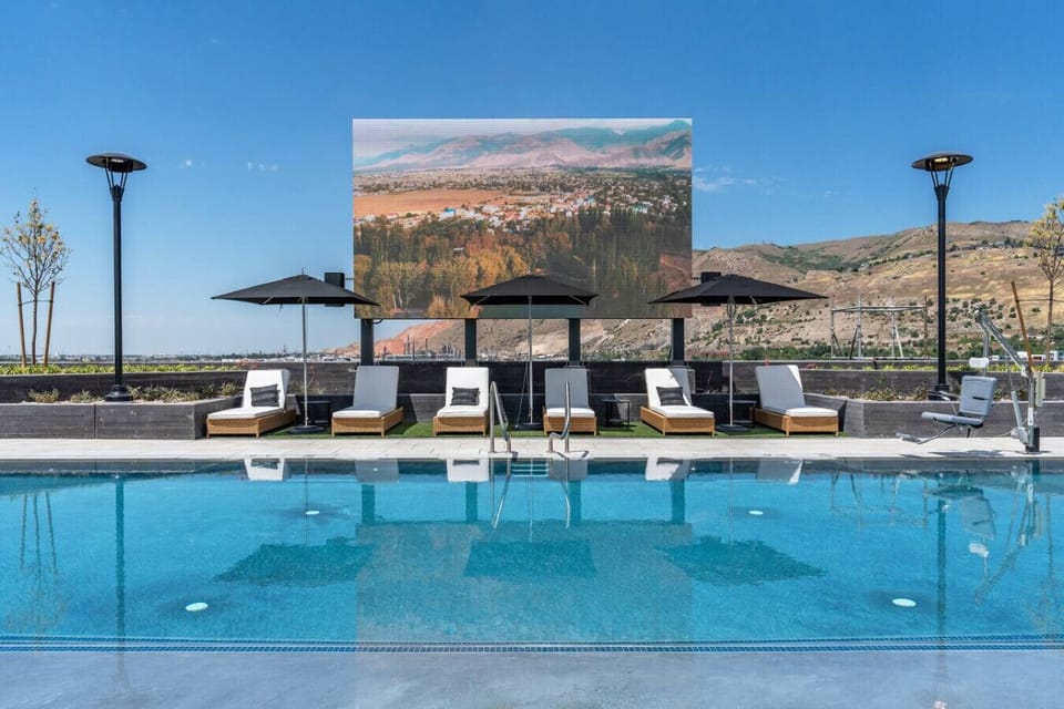 Rooftop swimming pool, 2 hot tubs and one HUGE JUMBOTRON for your entertainment.