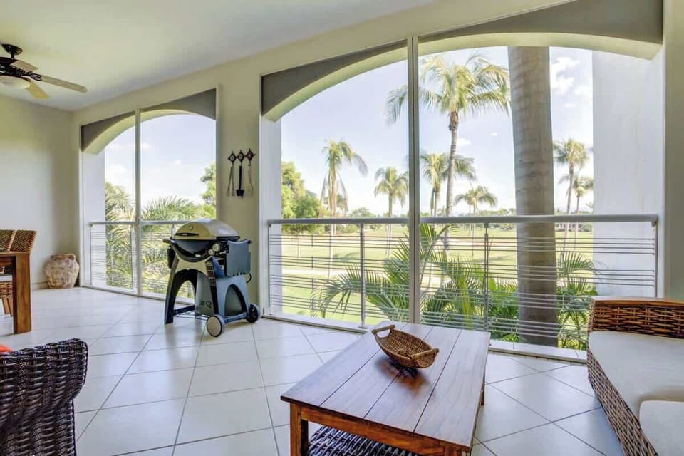 An amazing outdoor lounge with golf course views