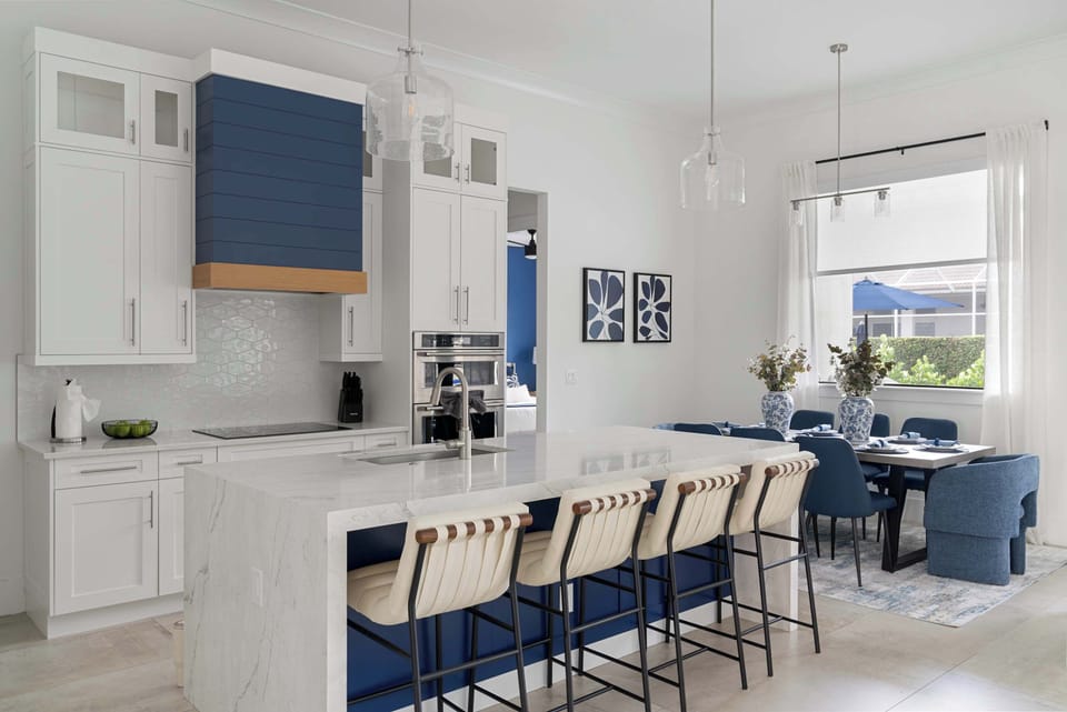 Open-concept living at its finest. The island seating flows right into the dining space, so no one's ever left out of the conversation.