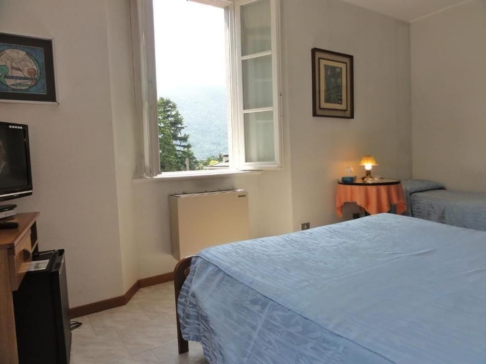 Basic Triple Room, Mountain View | In-room safe, iron/ironing board, free WiFi