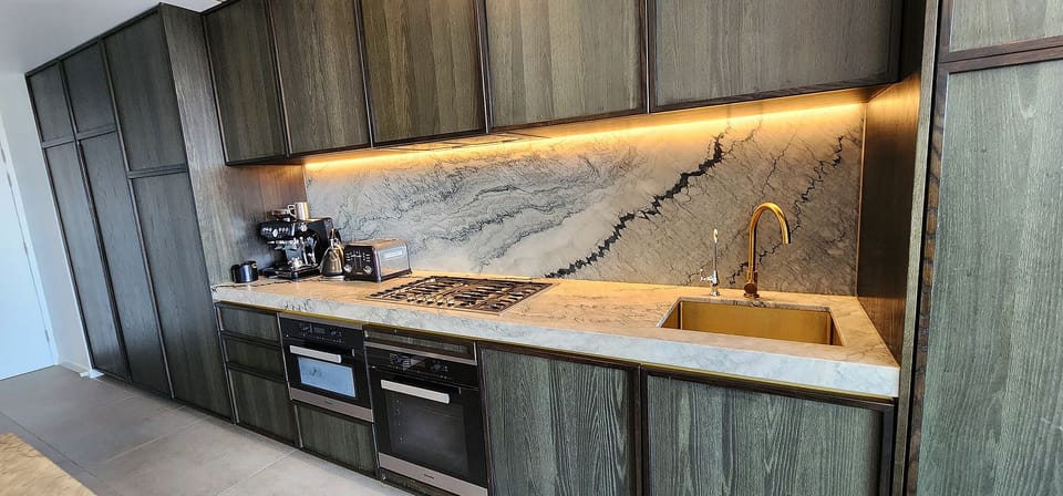 Barista style coffee machine, large marble kitchen island. Well equipped.