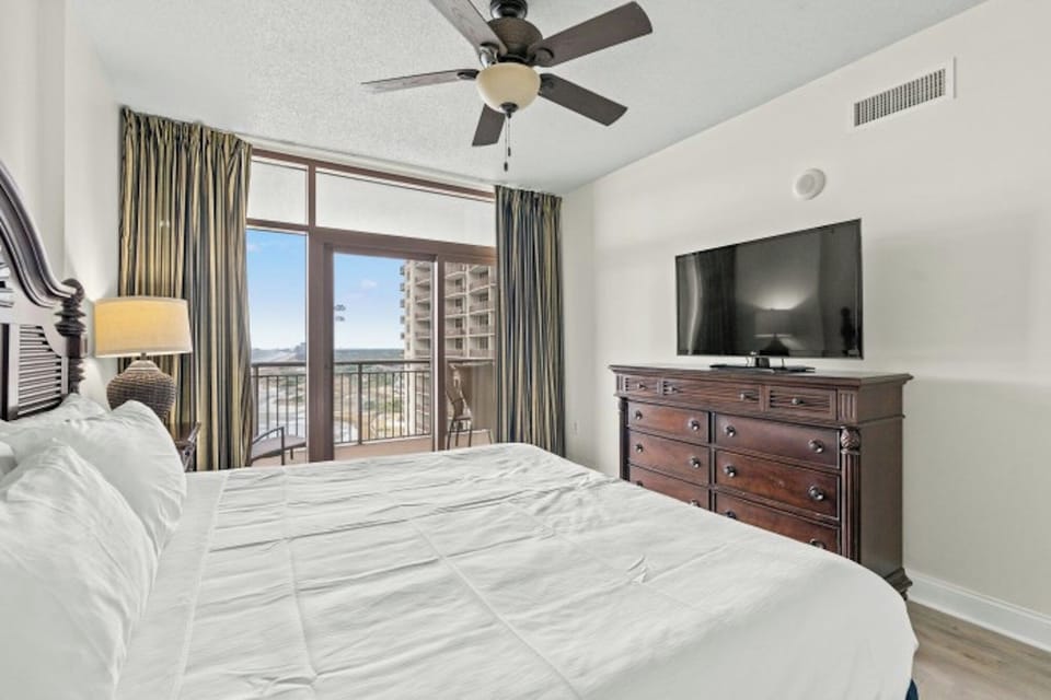 Awaken each morning to gorgeous views from the primary bedroom.