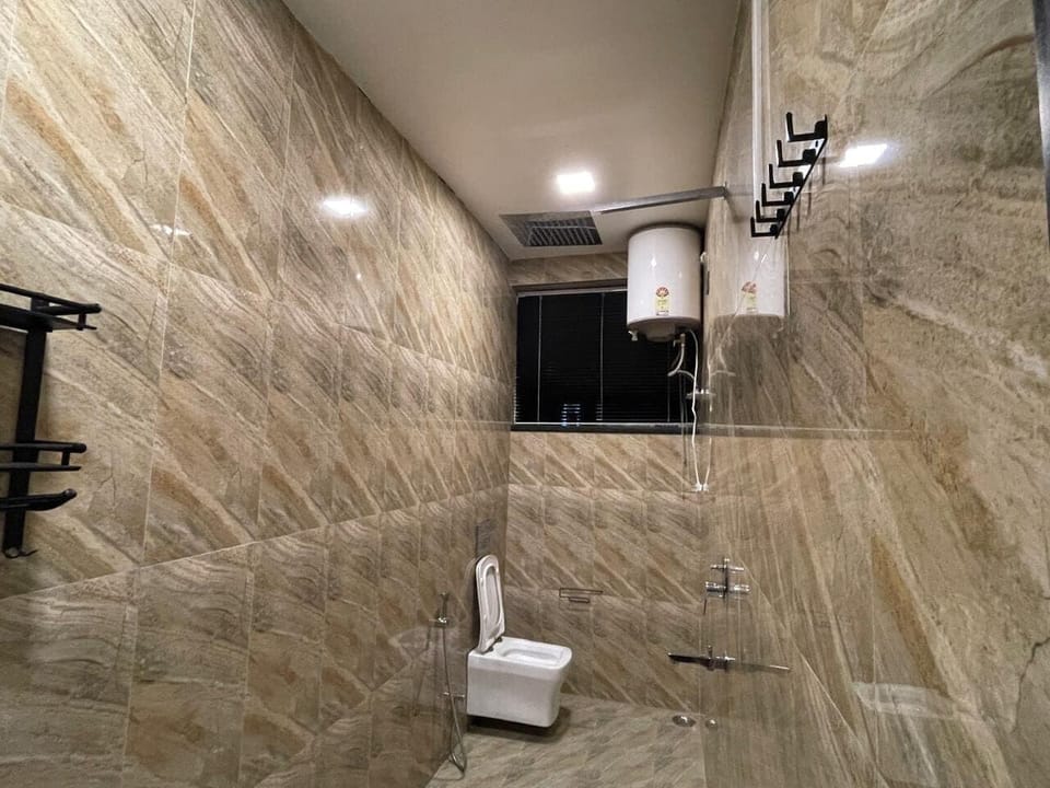 Deluxe Double Room, City View | Bathroom | Shower, towels, soap, toilet paper