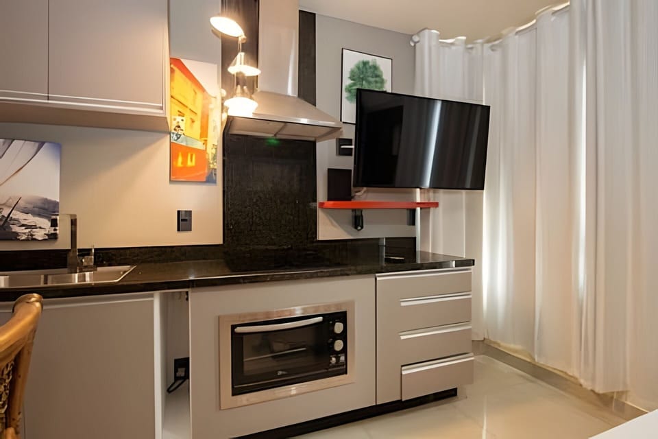 Basic Apartment | Private kitchen | Microwave, stovetop, cookware/dishes/utensils