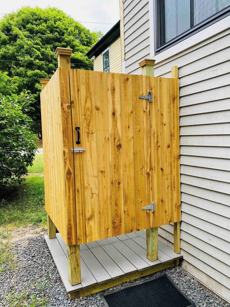 Outdoor shower for rinsing off after trips to the beach!  