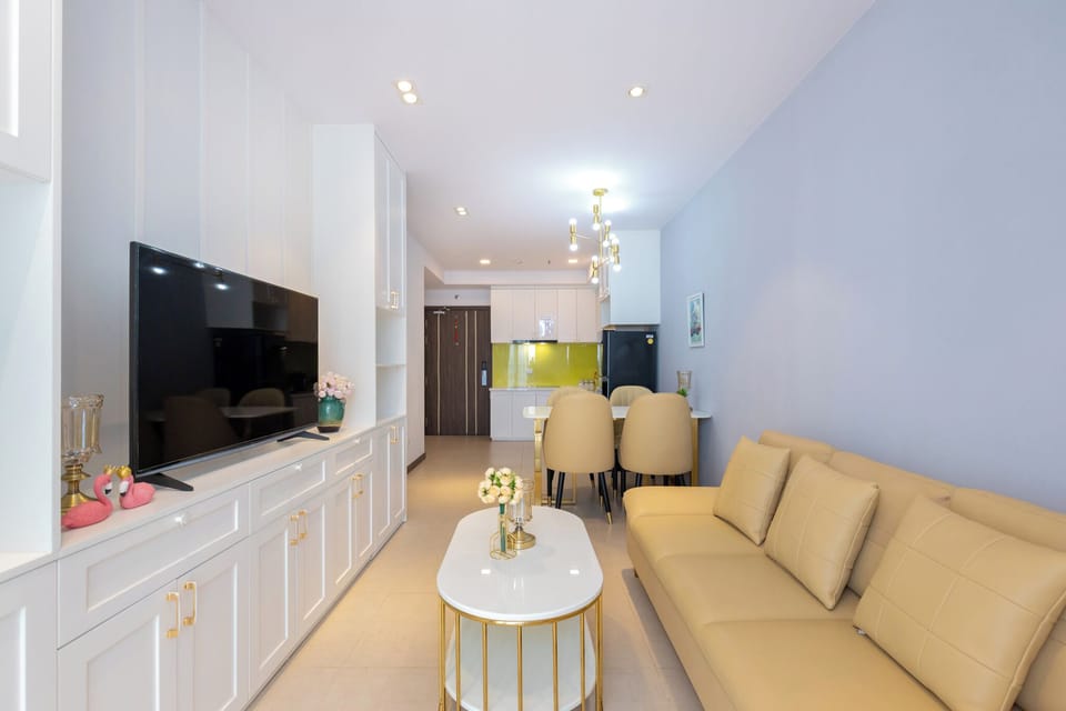 Deluxe Apartment, Partial Sea View | Living area | 32-inch Smart TV with cable channels