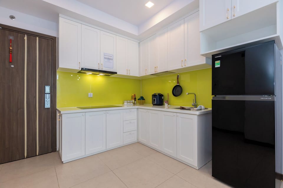 Deluxe Apartment, Partial Sea View | Private kitchen | Shared fridge