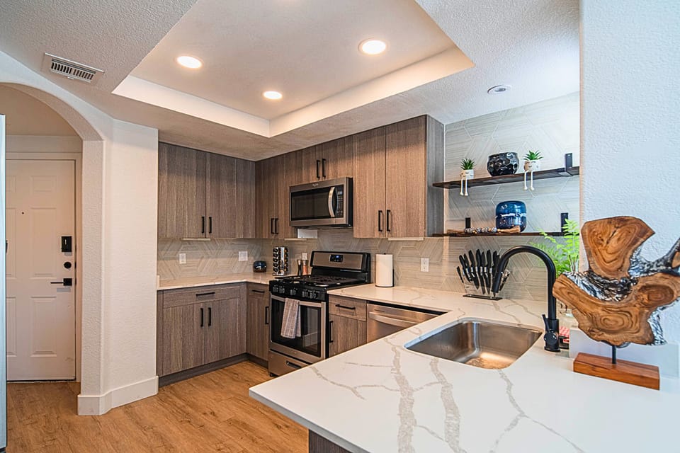Modern & Bright – Sleek appliances and natural light make this kitchen a joy to cook in.