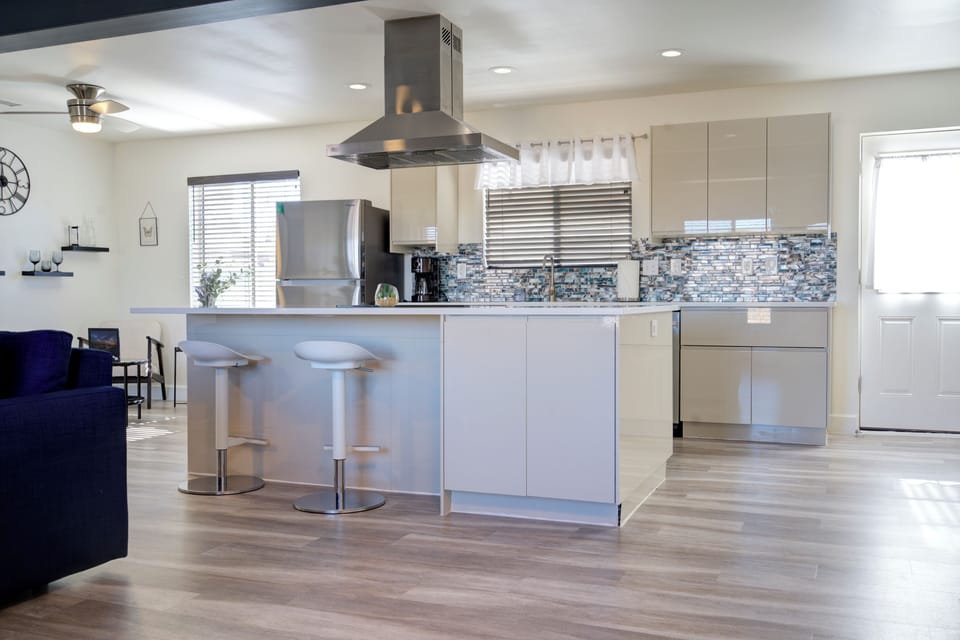 Modern, full kitchen with large island. Open plan with coffee & essentials 